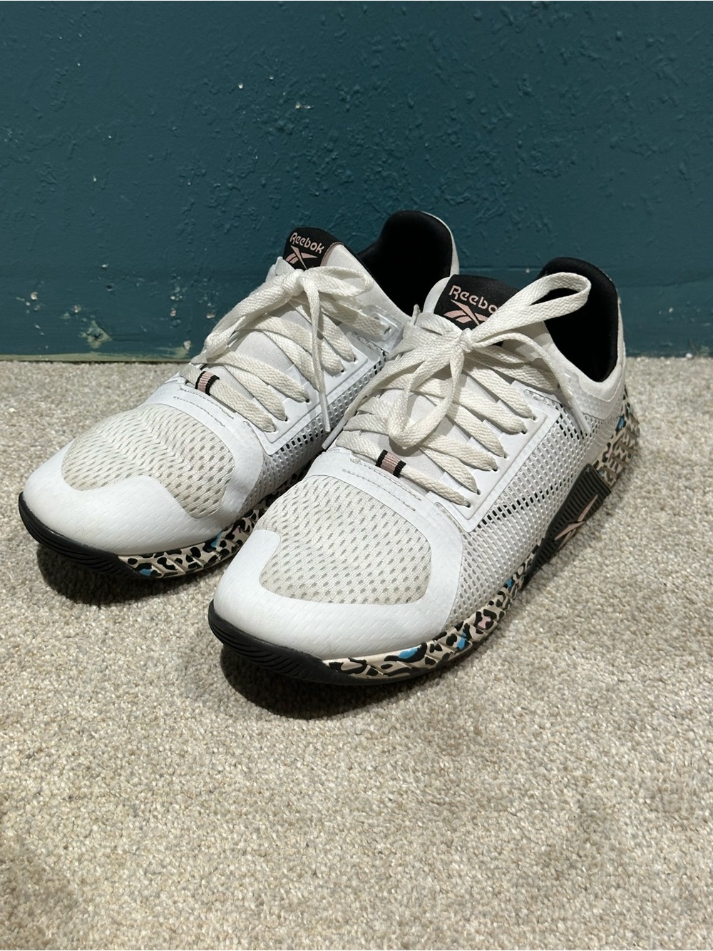 Reebok White Training Shoes with Leopard Sole